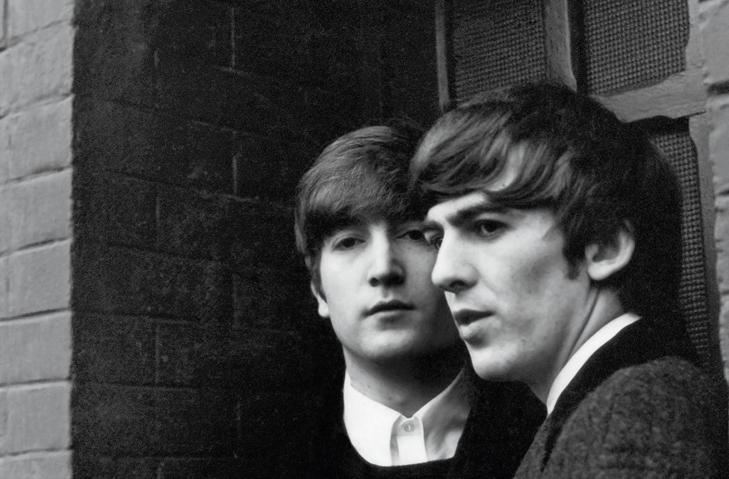 John Lennon and George Harrison Paris 1964