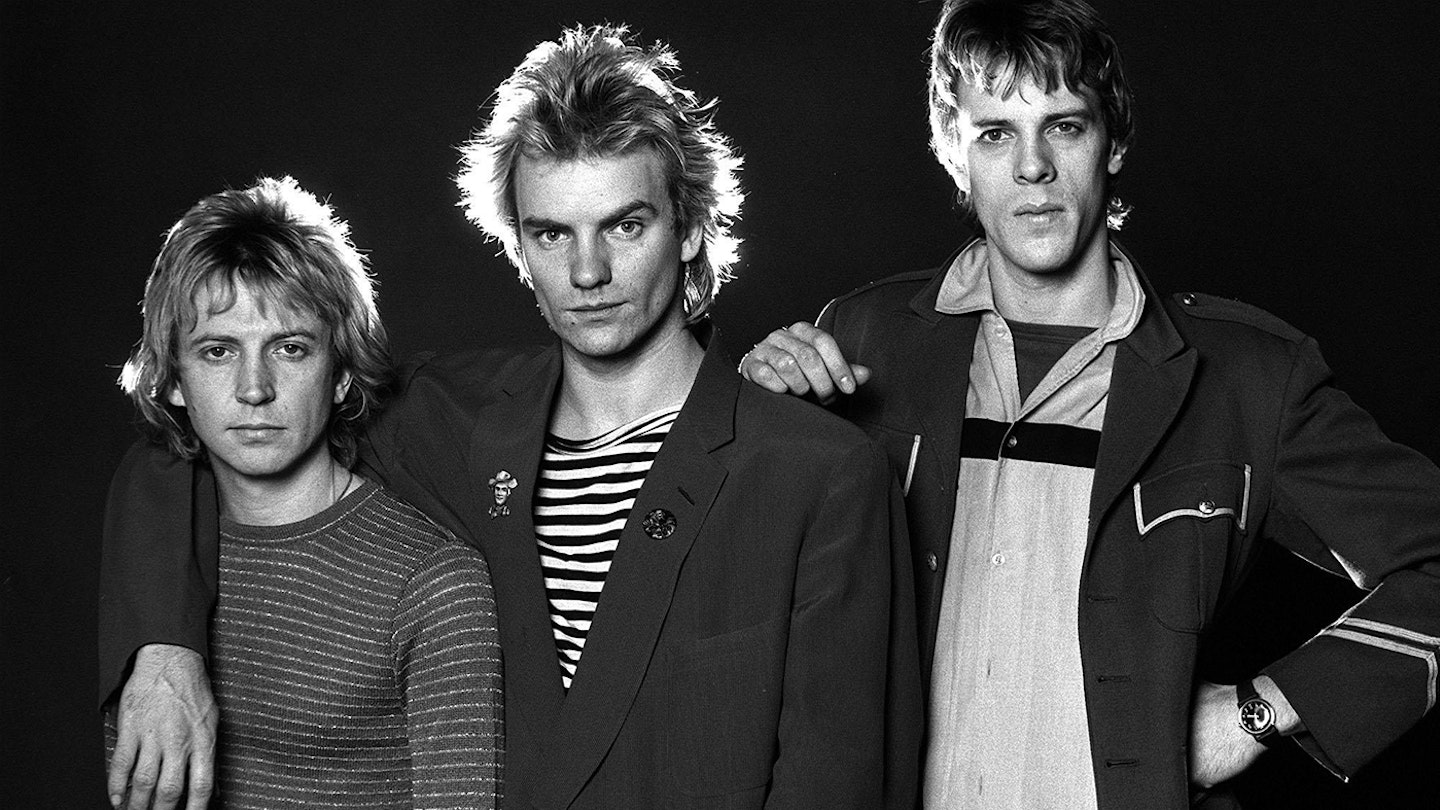 The Police band members in a black-and-white promotional photo, featuring Andy Summers, Sting, and Stewart Copeland.