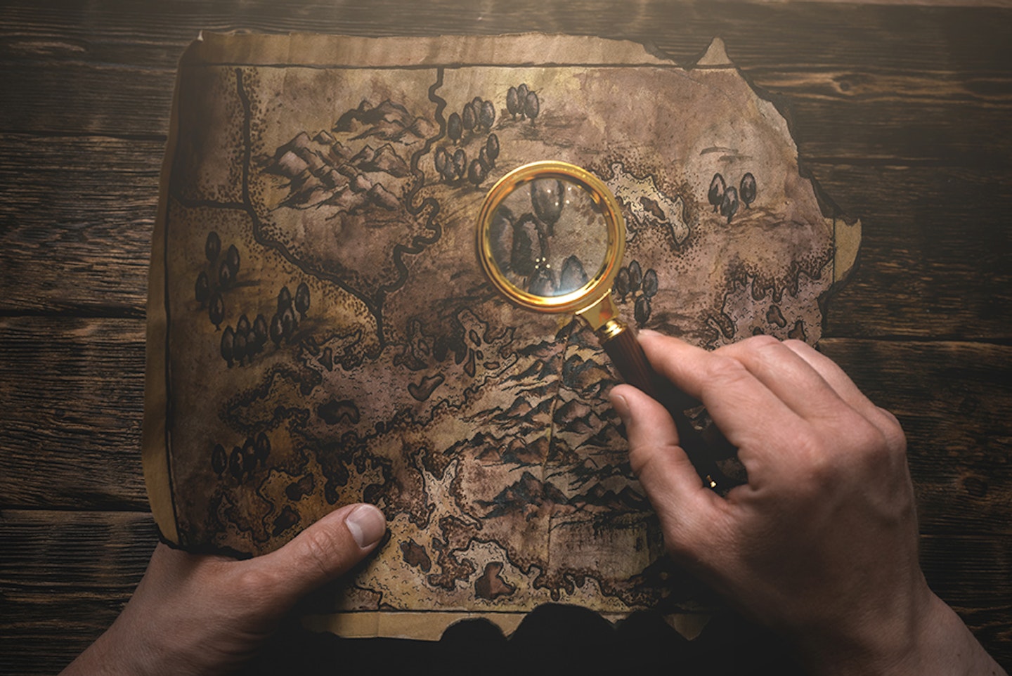 Treasure map with magnifying glass 
