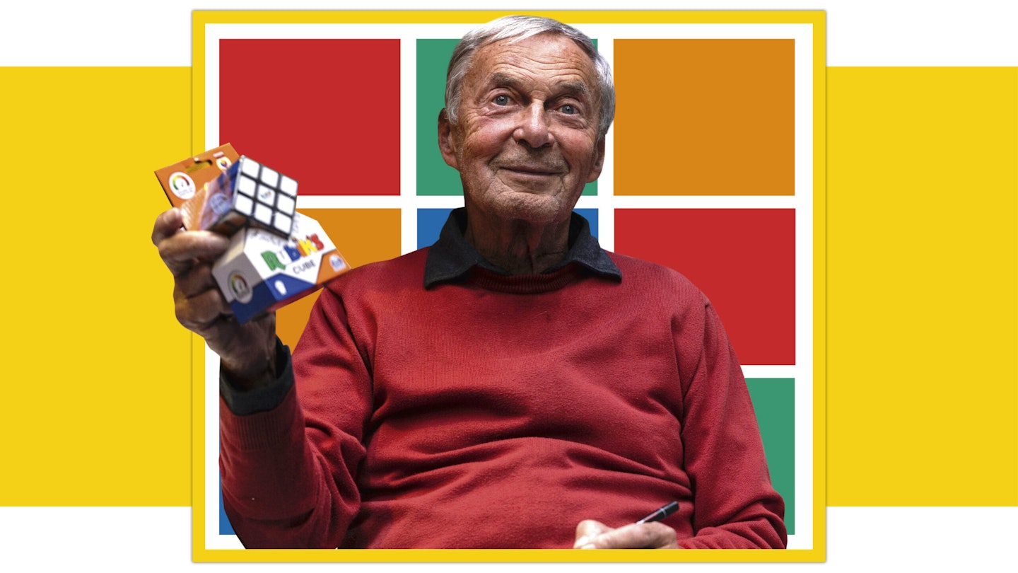 Erno Rubik with Rubik's Cube