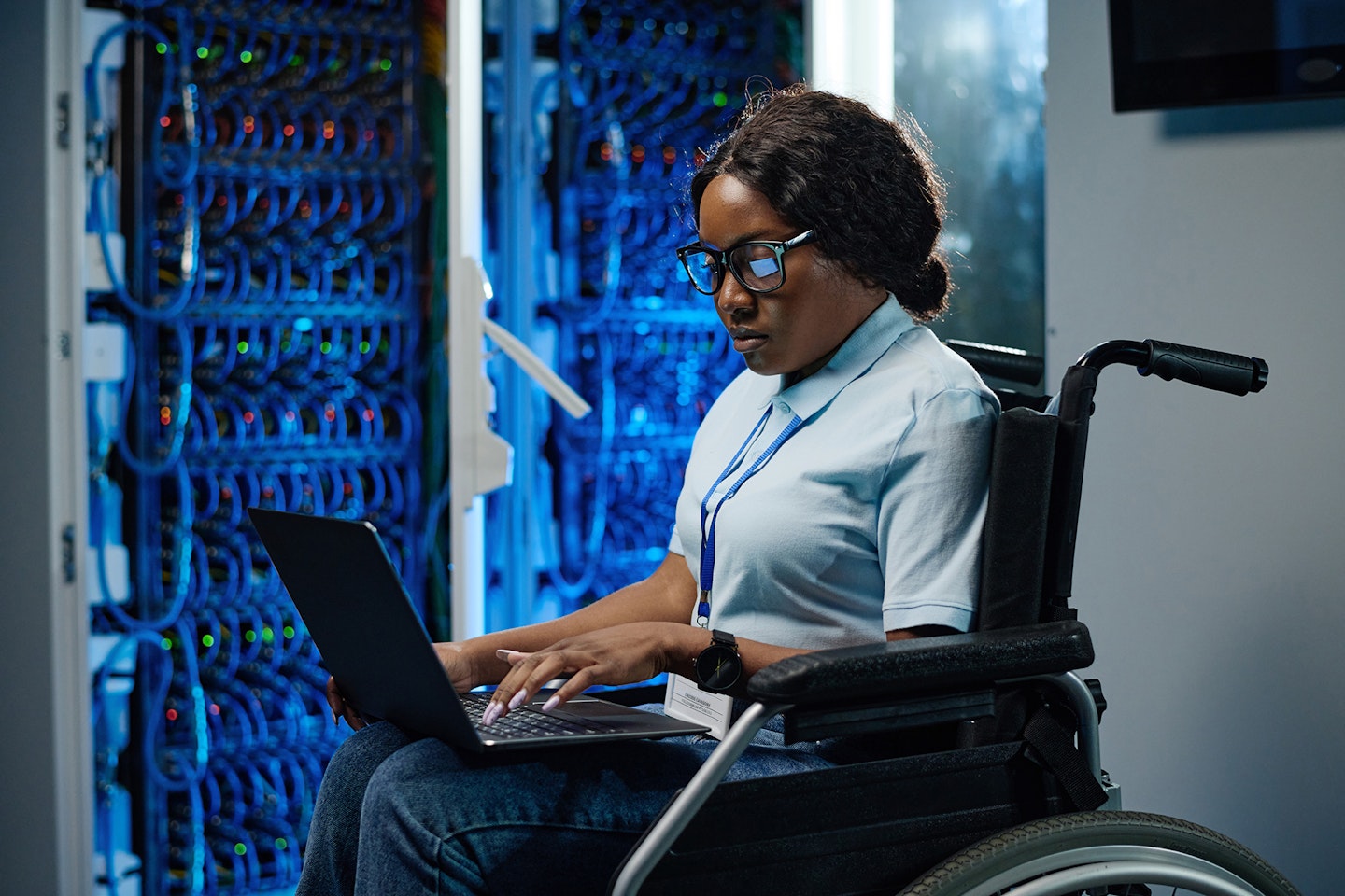Female engineer working in data centre