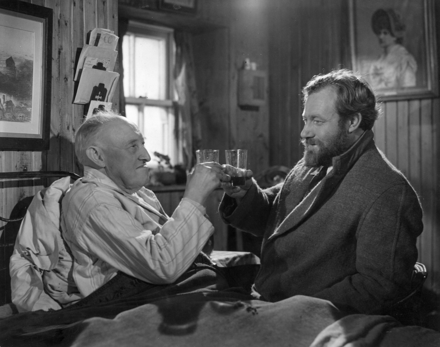 James Anderson (left) playing Old Hector and James Robertson Justice as Dr Maclaren in a scene from Whisky Galore!