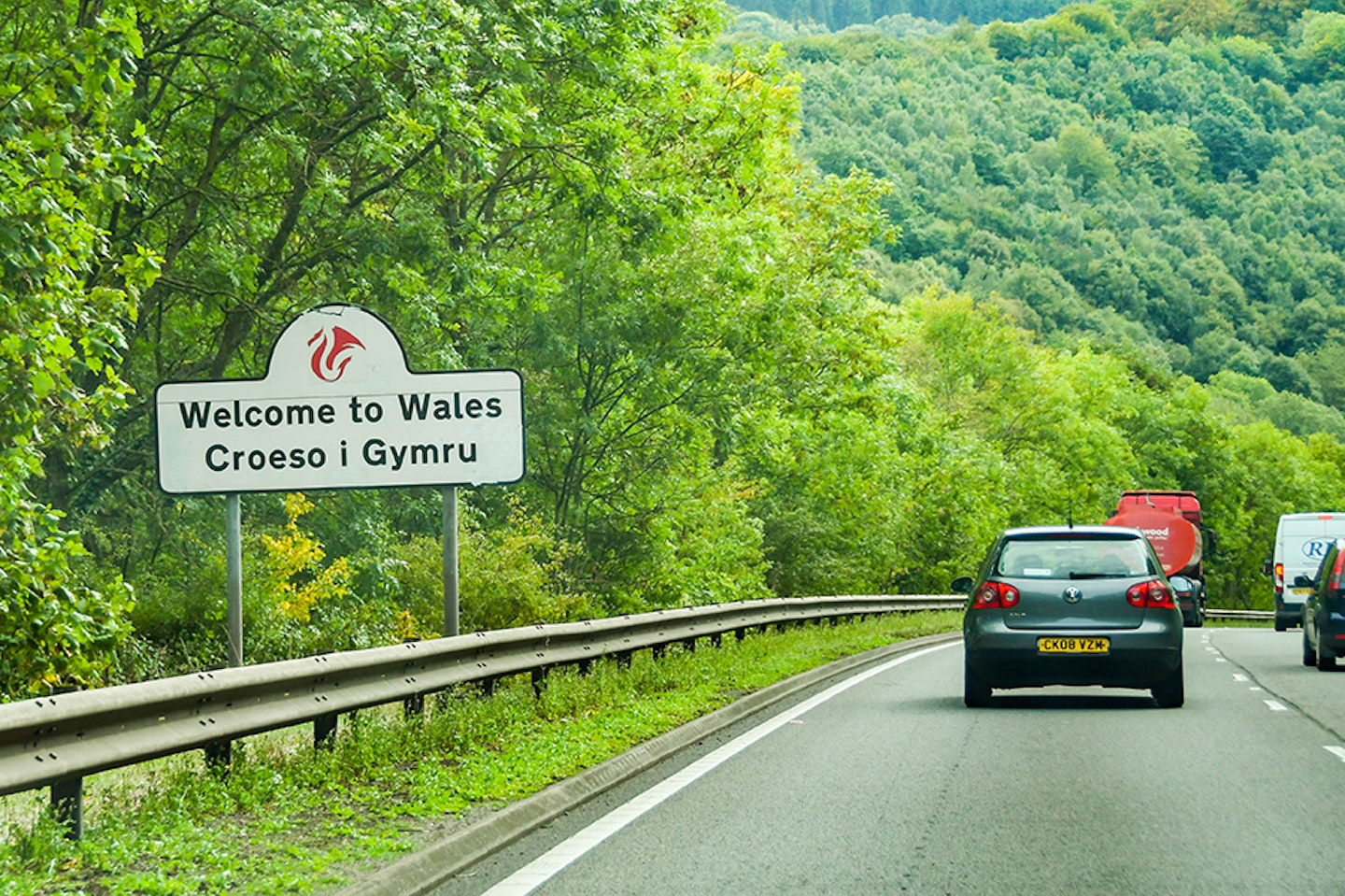 MONMOUTH, WALES - SEPTEMBER 2018: "Welcome to Wales" sign on the side of the A40 trunk road near Monmouth; Shutterstock ID 1398755948; purchase_order: -; job: -; client: -