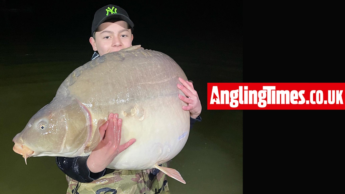12-year-old catches record 96lb mirror carp