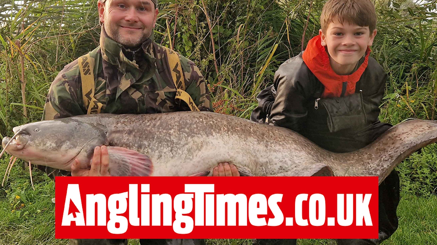10-year-old lands huge catfish as long as him!