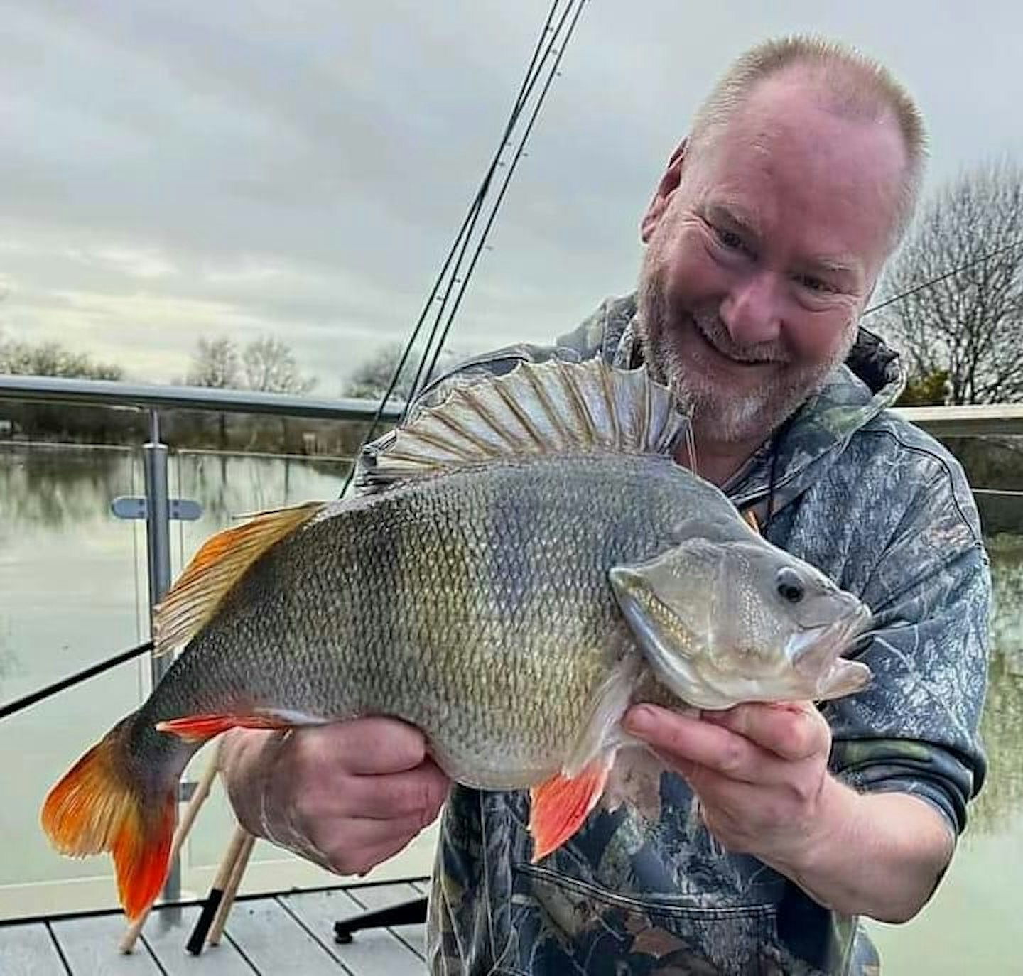 Paul Topley with his huge 5lb 2oz perch from Clawford Lakes.
