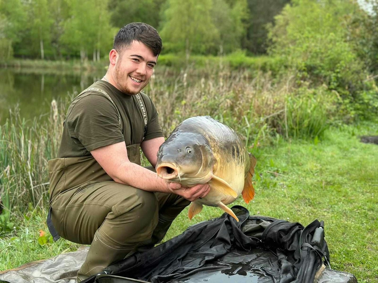 Stephen holding up one of five, 50lb carp landed during the session!