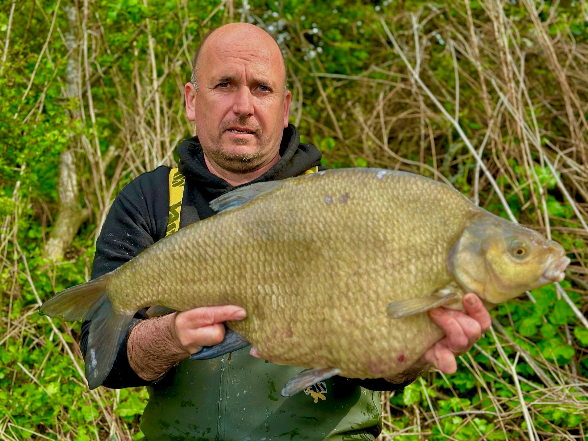 Lee proudly displaying his 17lb 2oz bream.