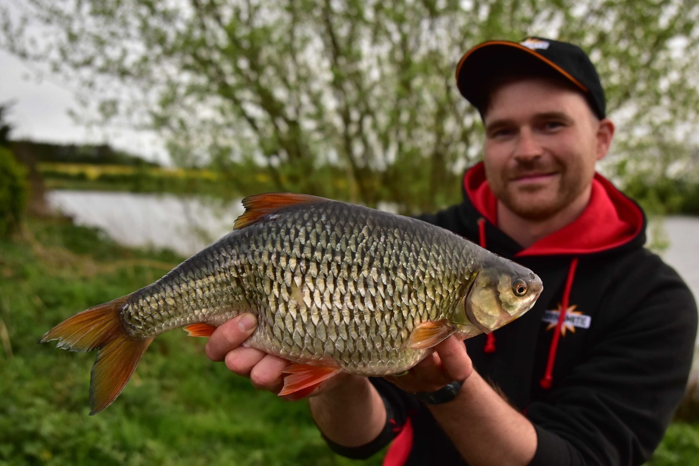 Sam Brown with his truly enormous 3lb 2oz roach.