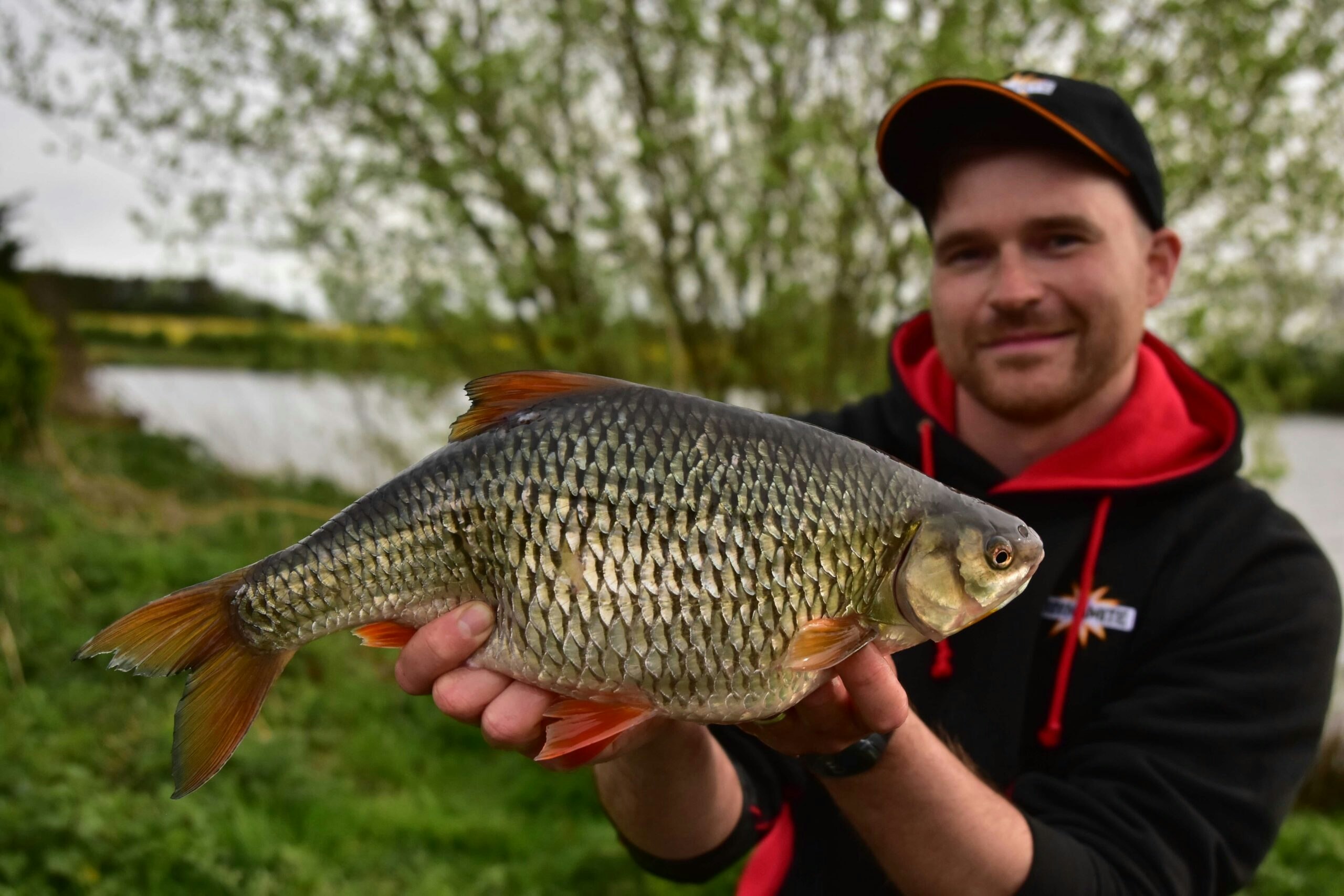 Sam Brown with his truly enormous 3lb 2oz roach.