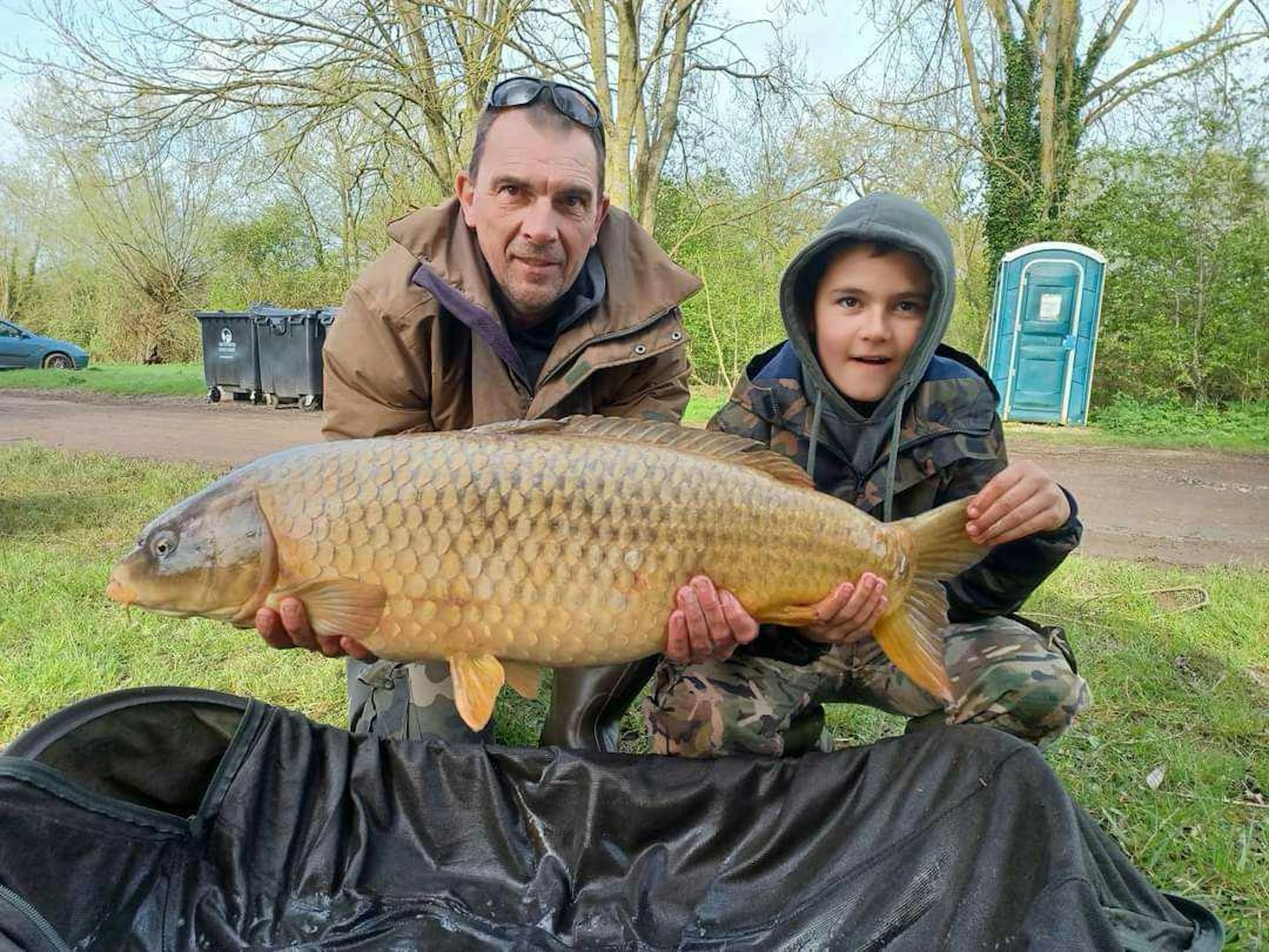Max and his dad, Chris with their Oxlease record ghost carp.