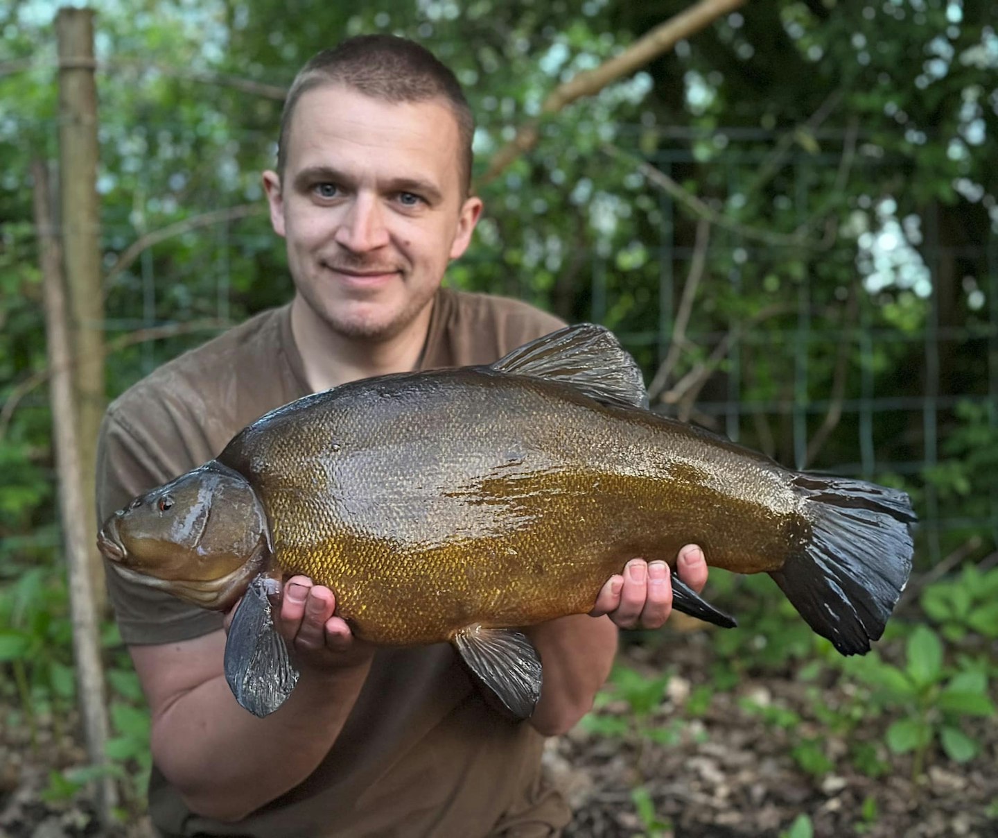 Aaron with his superb 11lb 3oz tench.