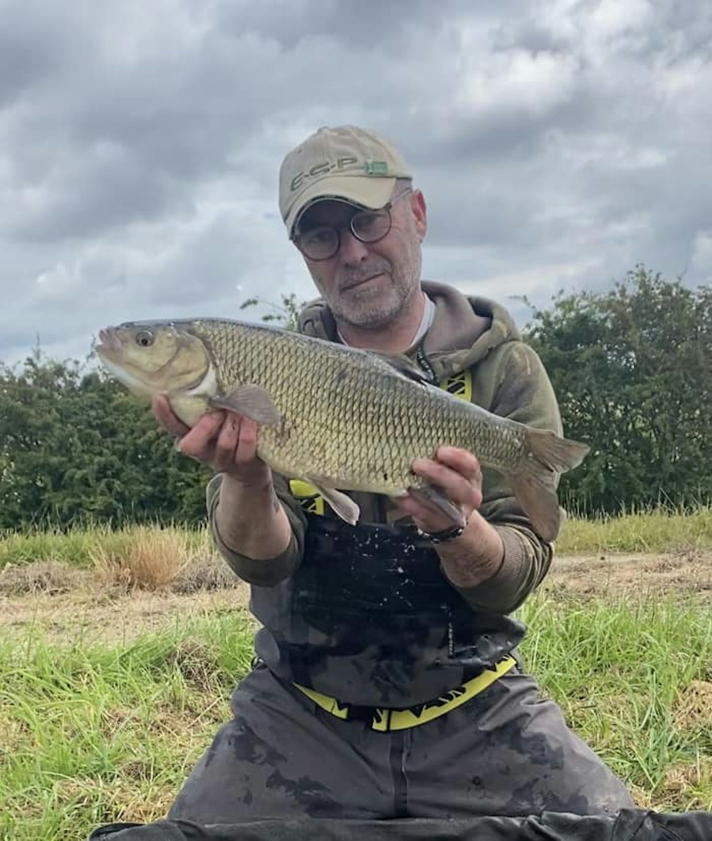 Chris Darke with one of the ide he has caught from his local river.