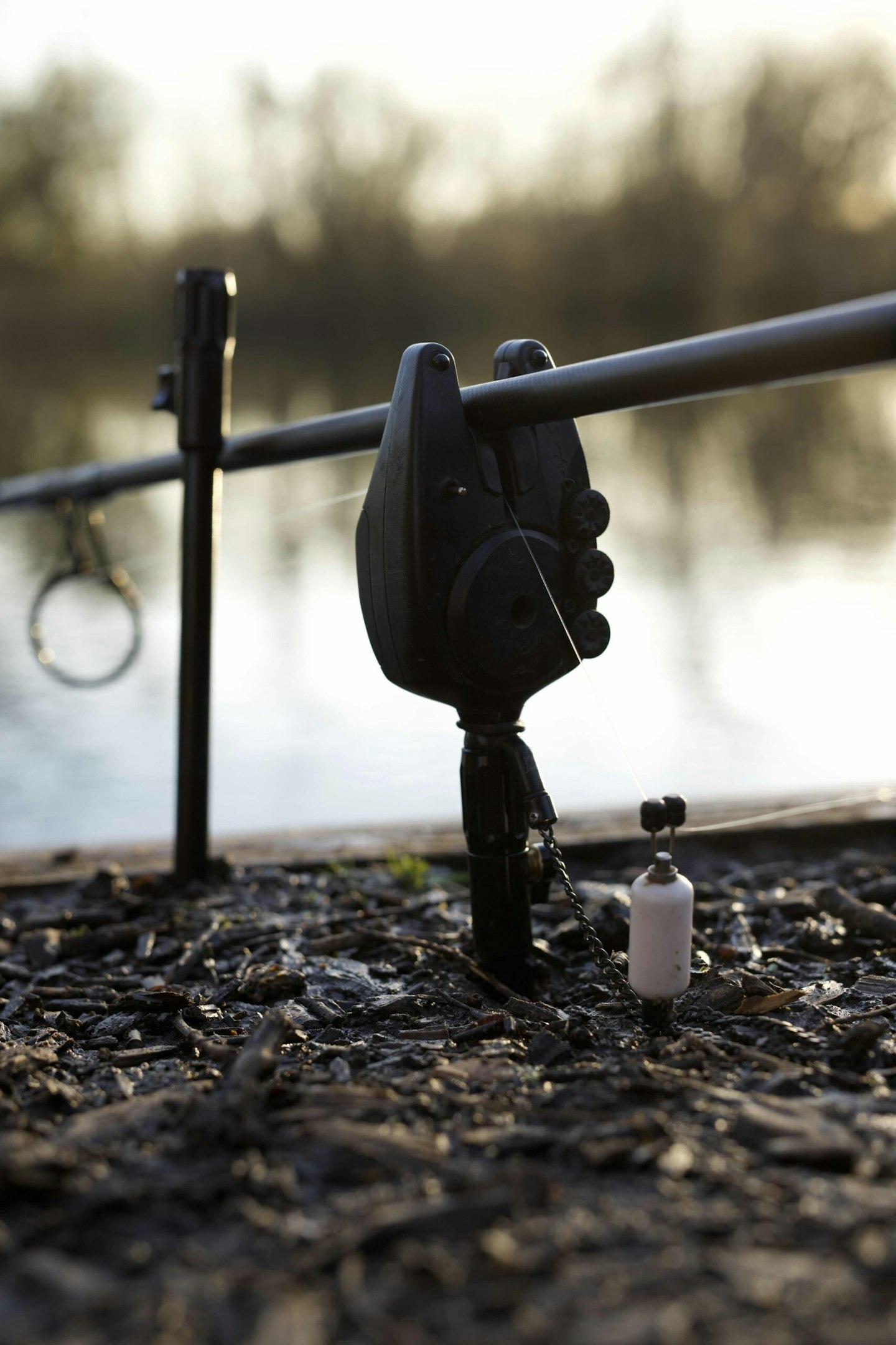 Placing a bank stick halfway up the rod will prevent the rod being dragged in.