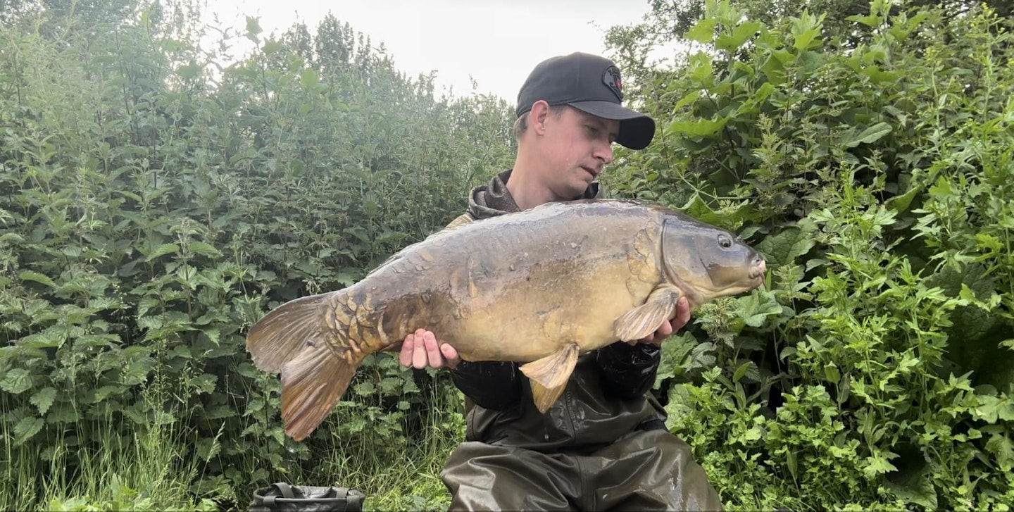 One of many carp before he caught the huge bream...