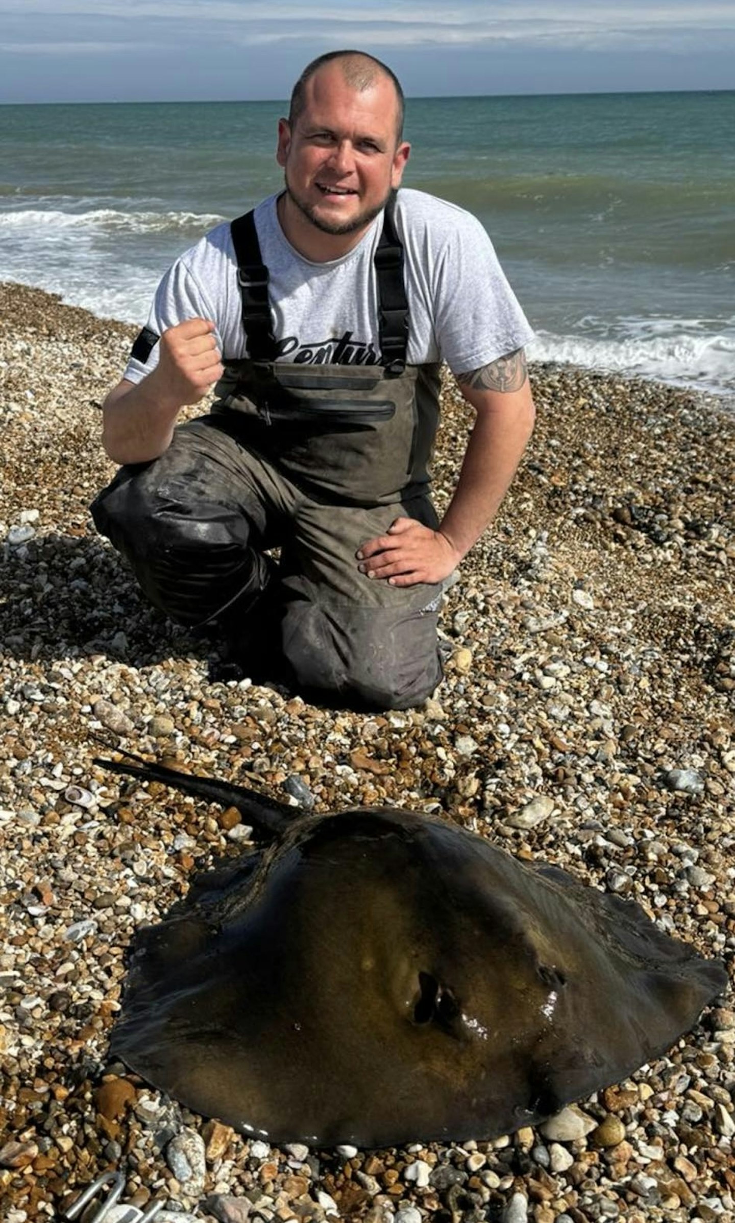 Shane Merrick with his impressive 40lb fish.