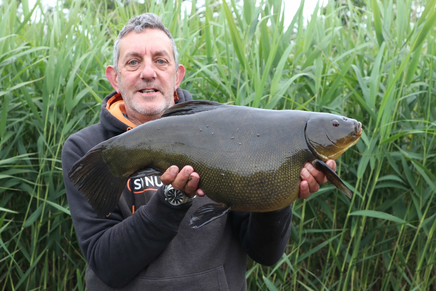 Dai with the tench he has been waiting for!