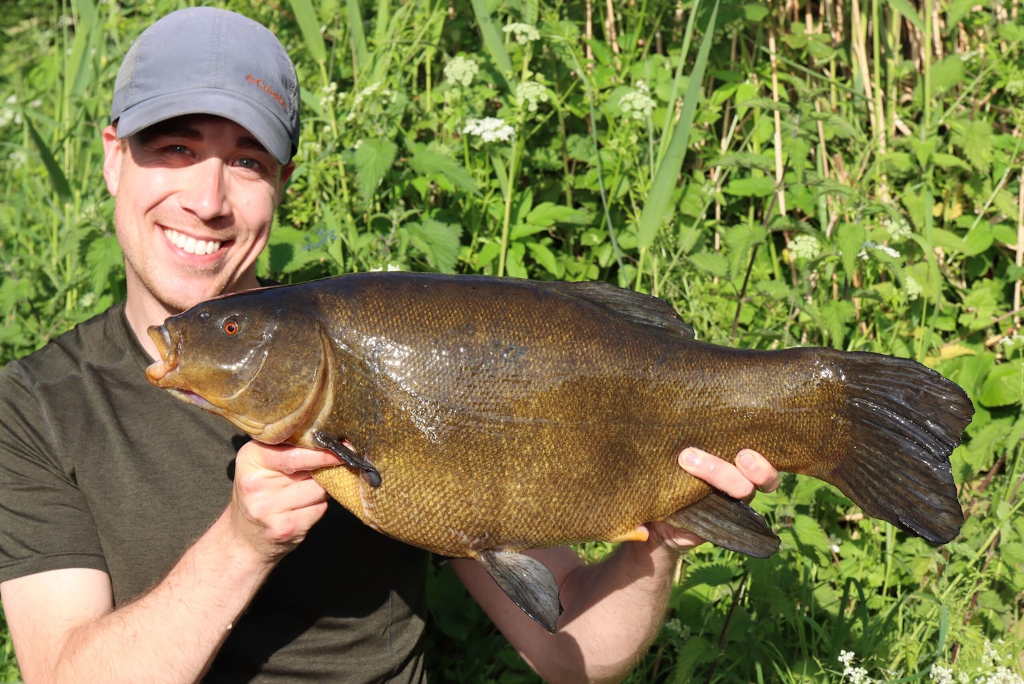 James with the 11lb 2oz tench from the previous session