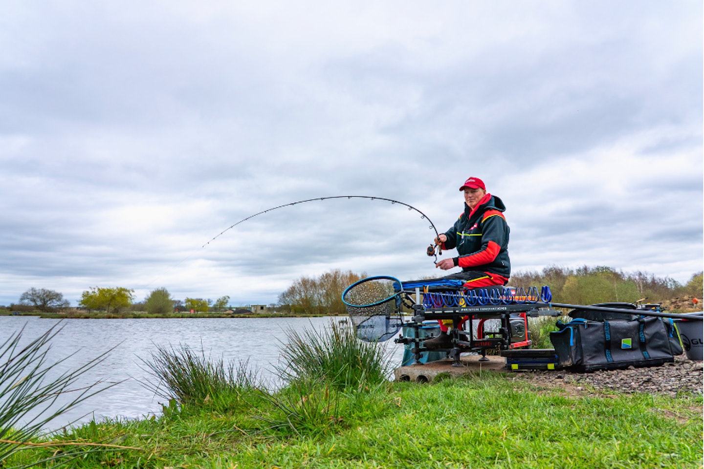 a fishing rod reel 5' Ultra Light Action 2 Piece Fiberglass/Graphite Spinning Rod and 2000 Spinning Reel Package