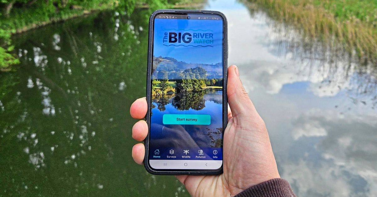 image of phone with the Big River Watch app on.