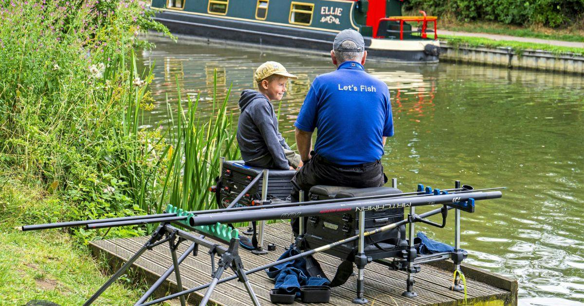 Angler leaning how to fish during Let's fish event