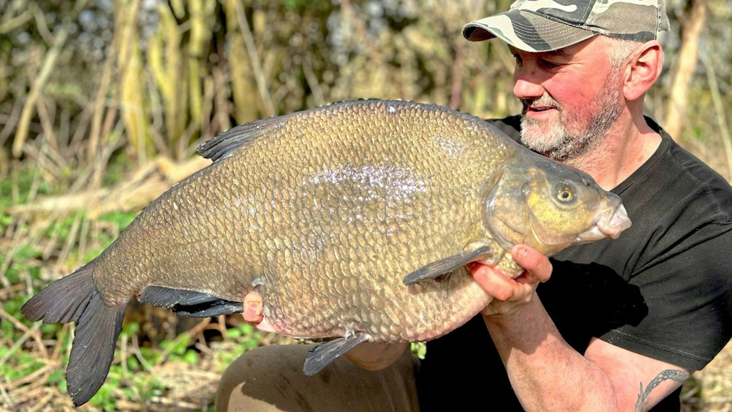 Angler battles through storm to bank massive bream