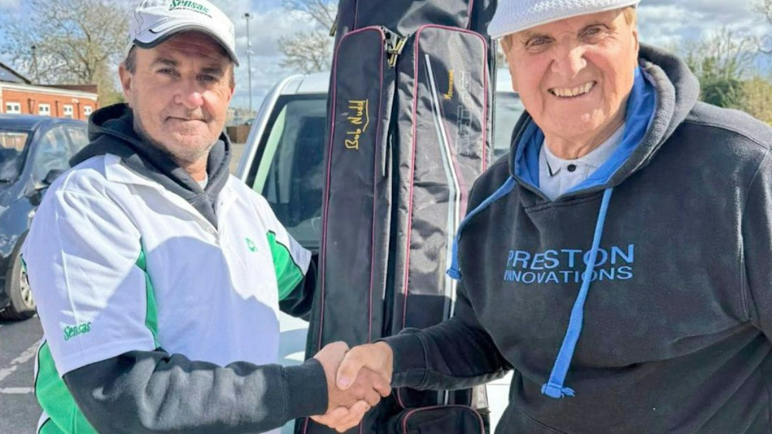 Lucky angler meeting their fishing hero