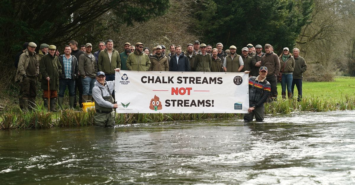 protest in river to highlight damage off sewage pollution