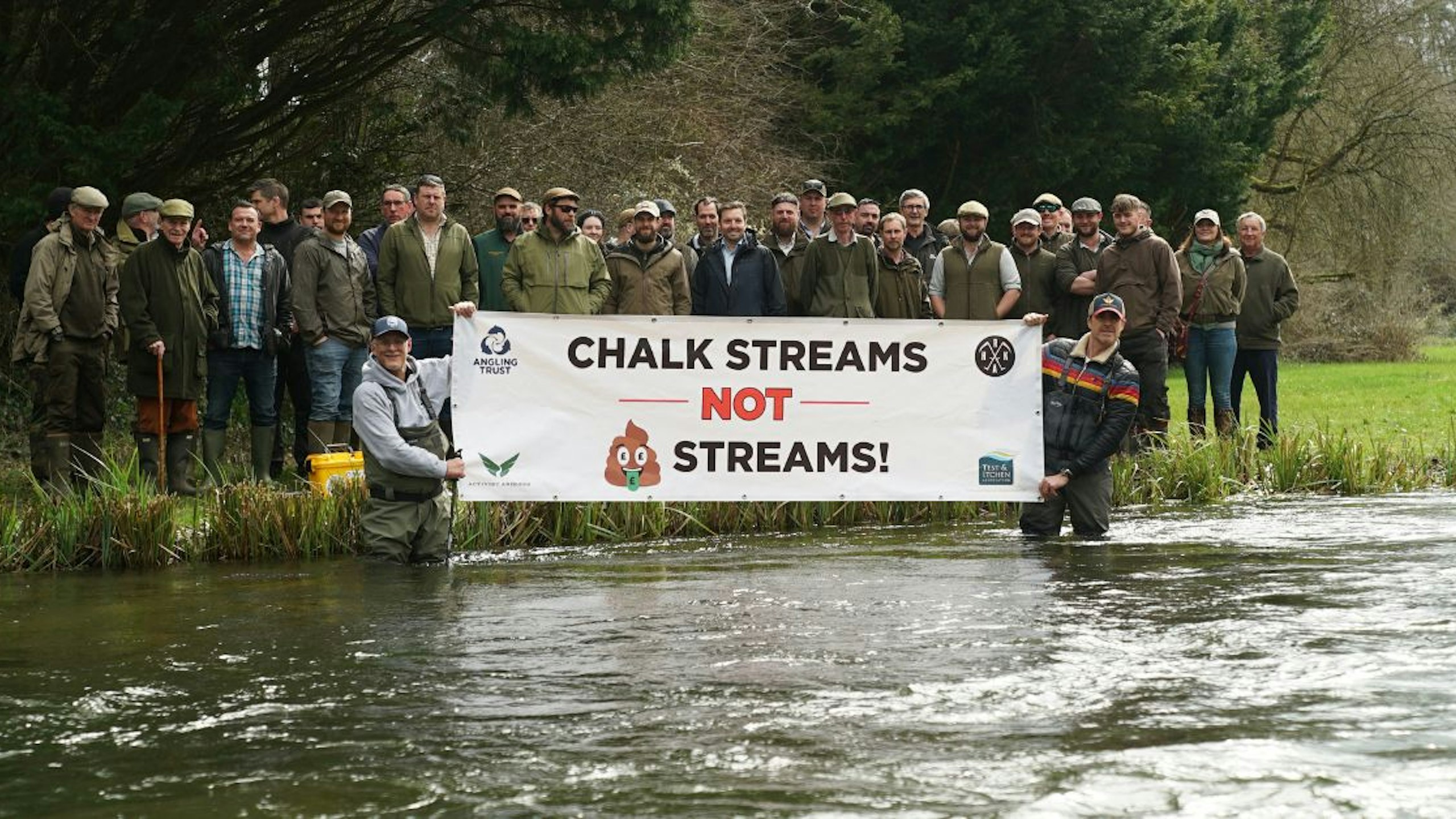 protest in river to highlight damage off sewage pollution