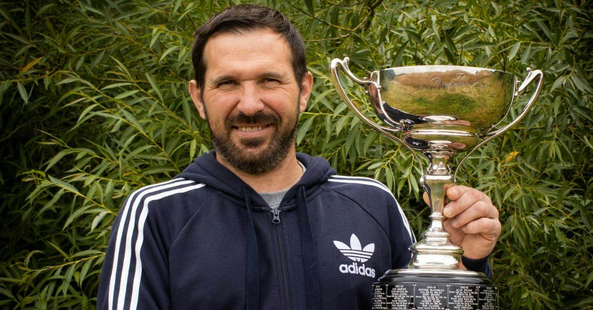 Simon Daley holding the Drennan Cup