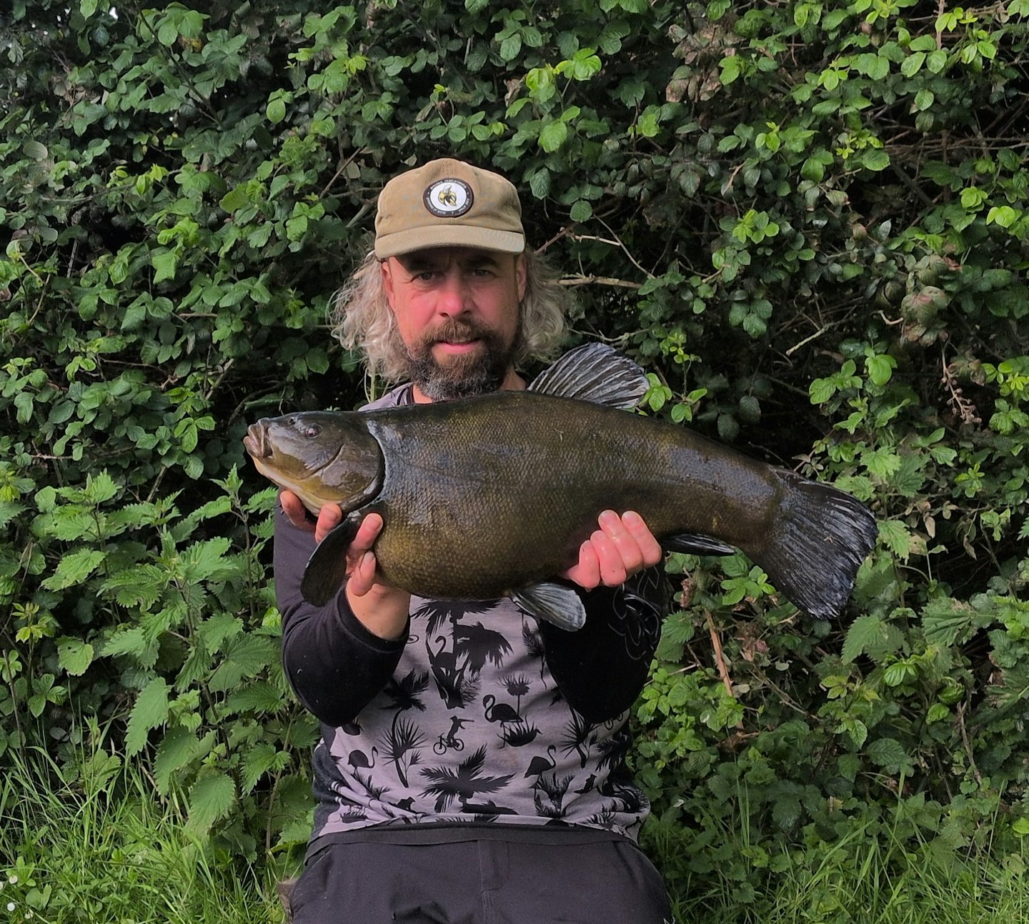 Angler Stunned as Giant 11lb Tench Smashes PB