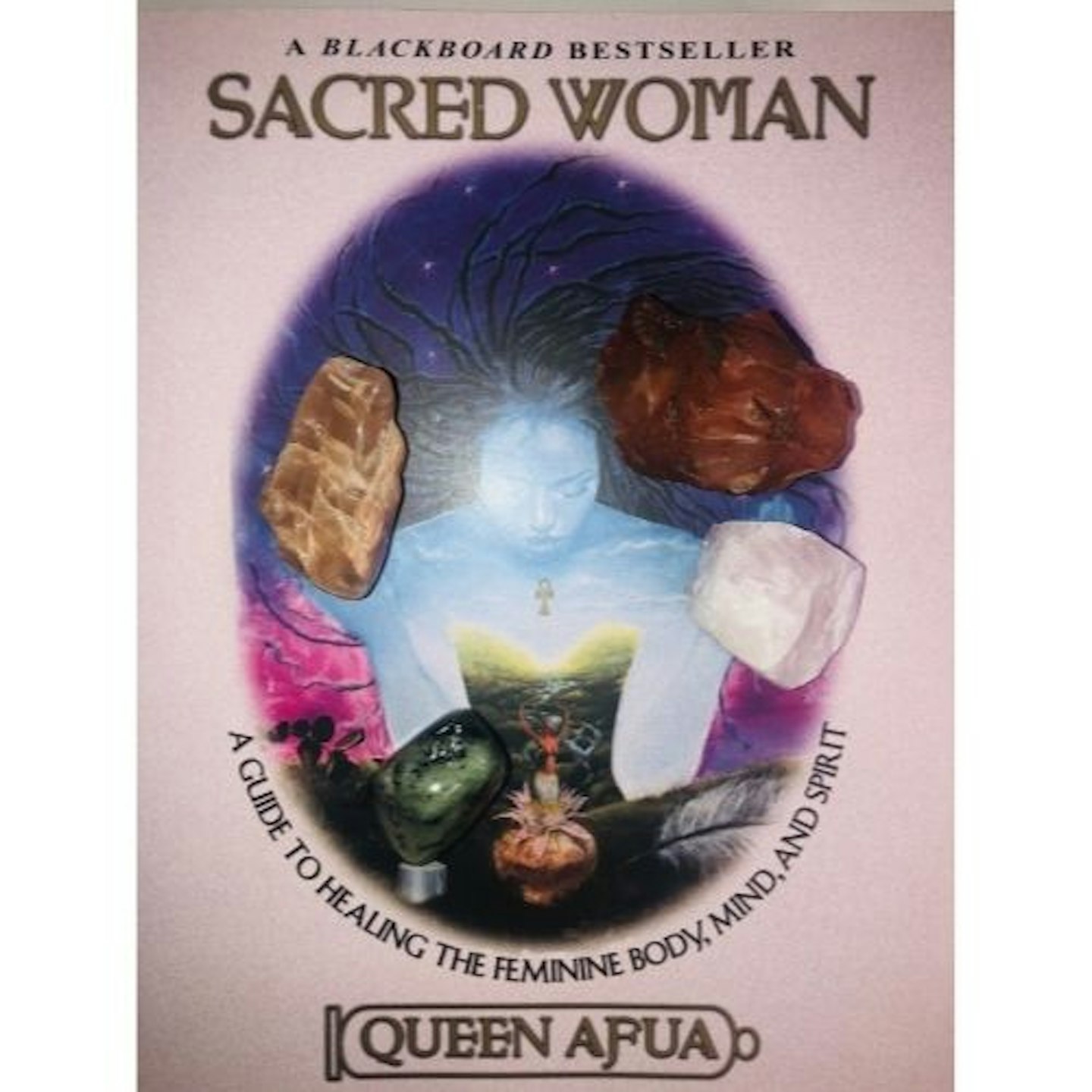 best wellbeing books - Sacred Woman: A Guide to Healing the Feminine Body, Mind, and Spirit by Queen Afua