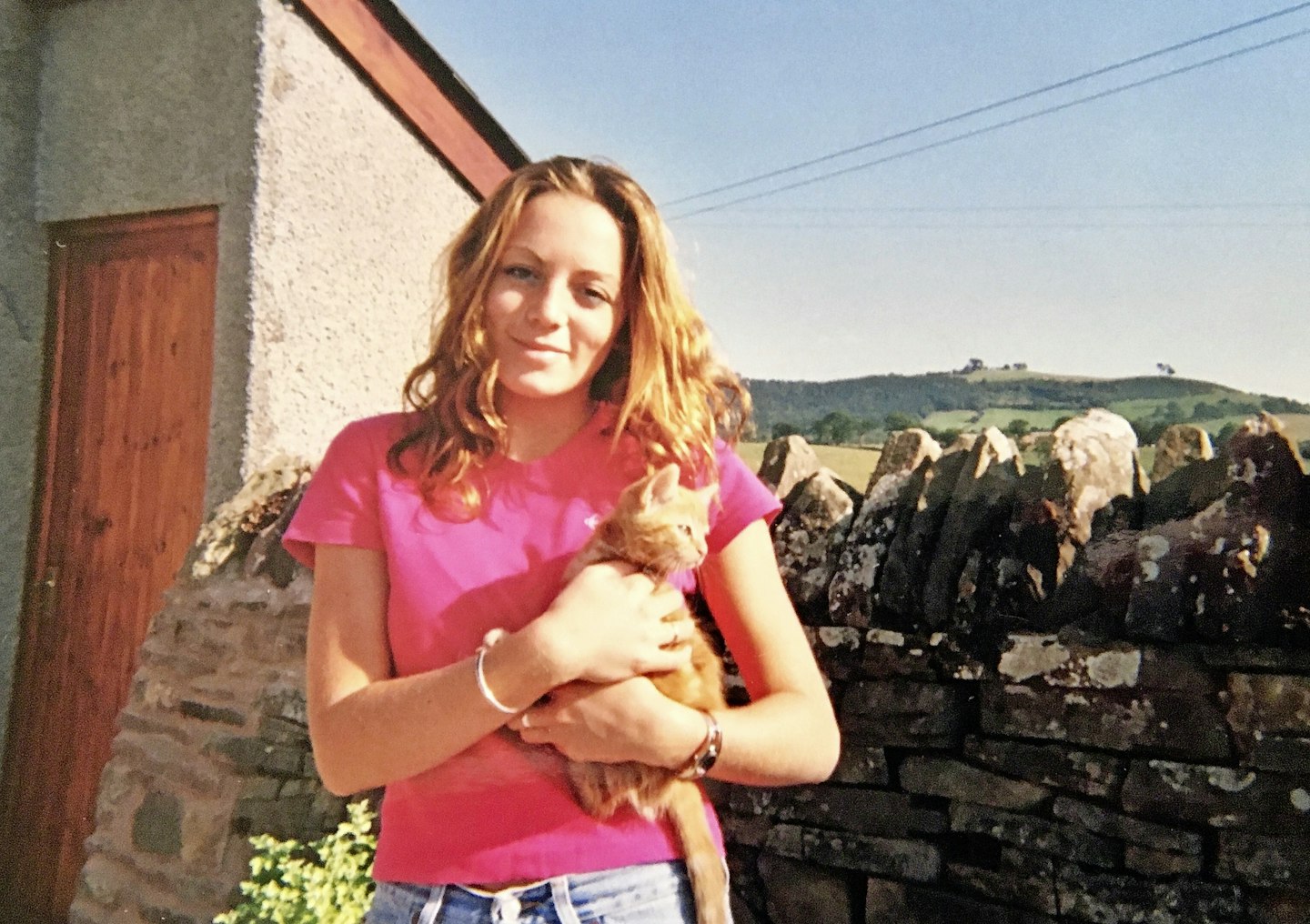 Young woman with cat