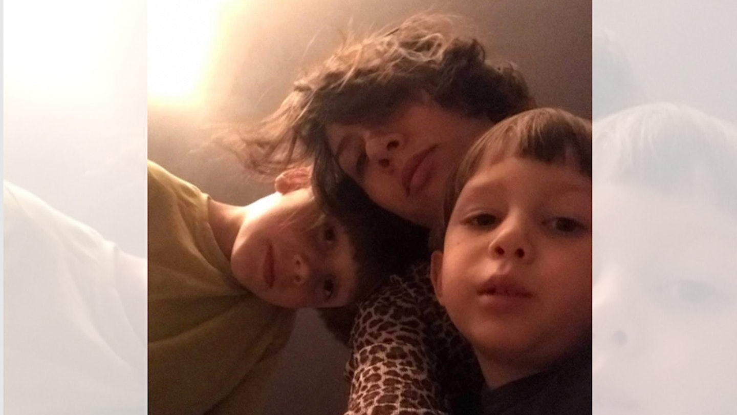 Mum taking selfie with two young boys