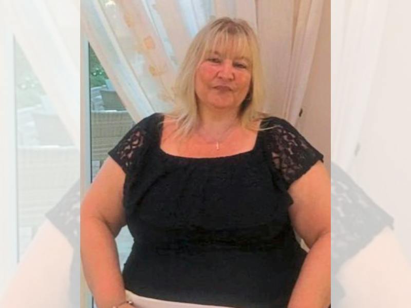 blonde woman in black top before diet