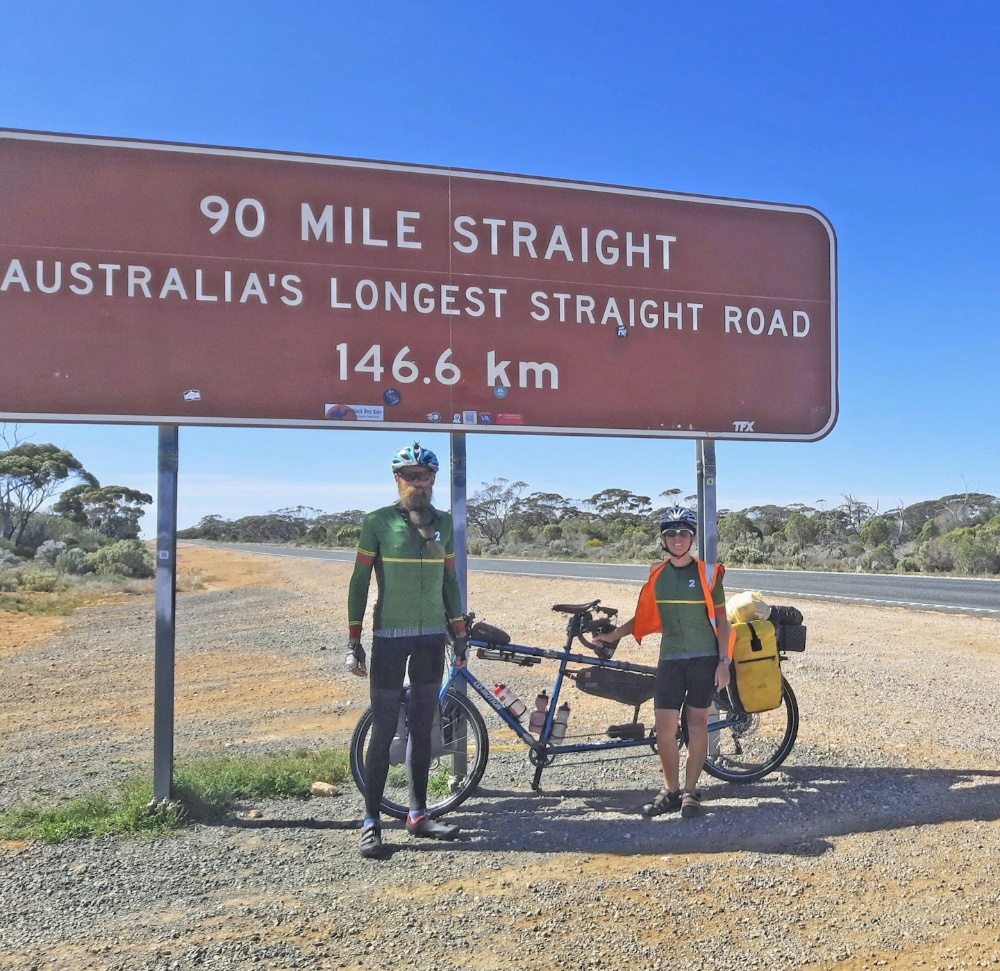 couple ride a tandem bike around the world