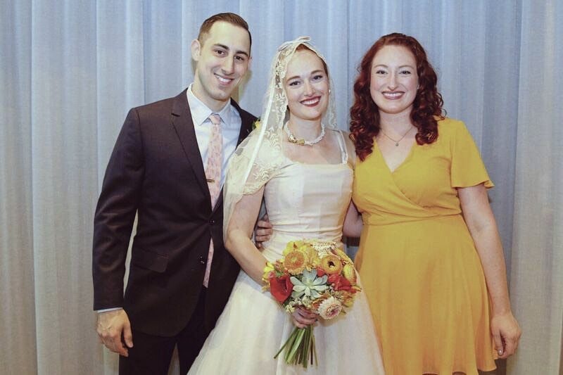 two brides, one groom
