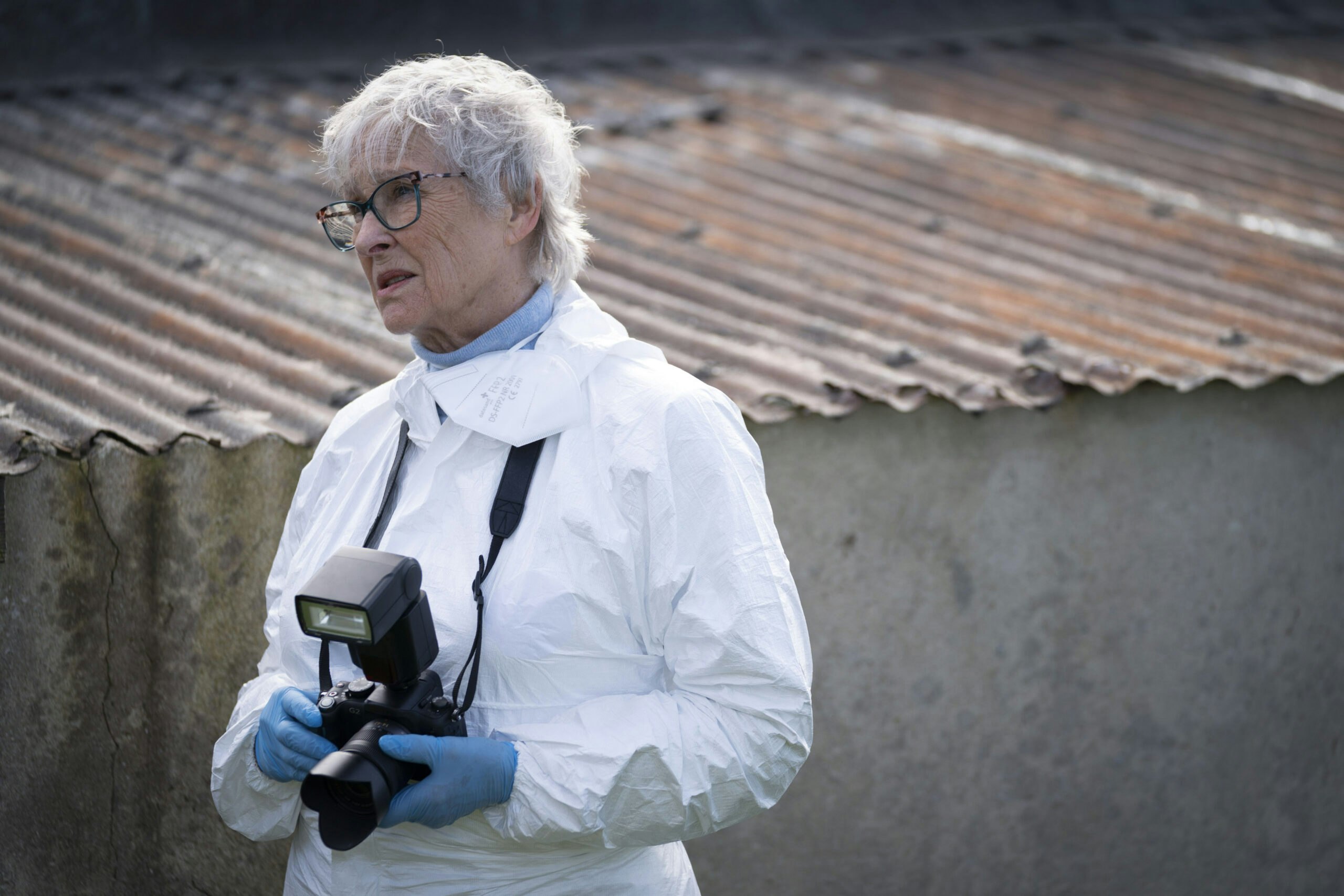 Anne Kidd as Pathologist Cora McLean