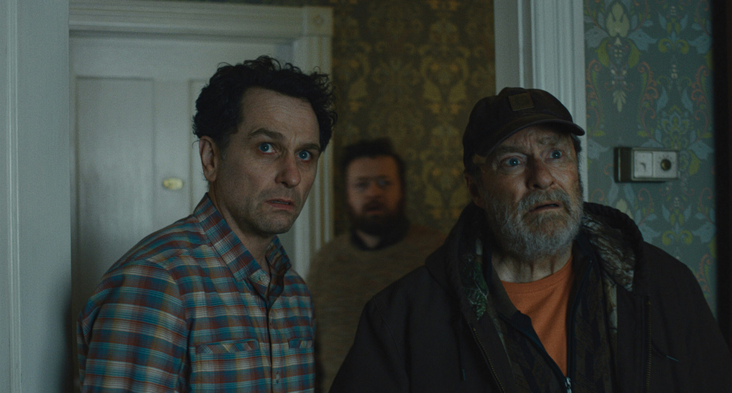 Matthew Rhys and Stephen Root in Widow's Bay