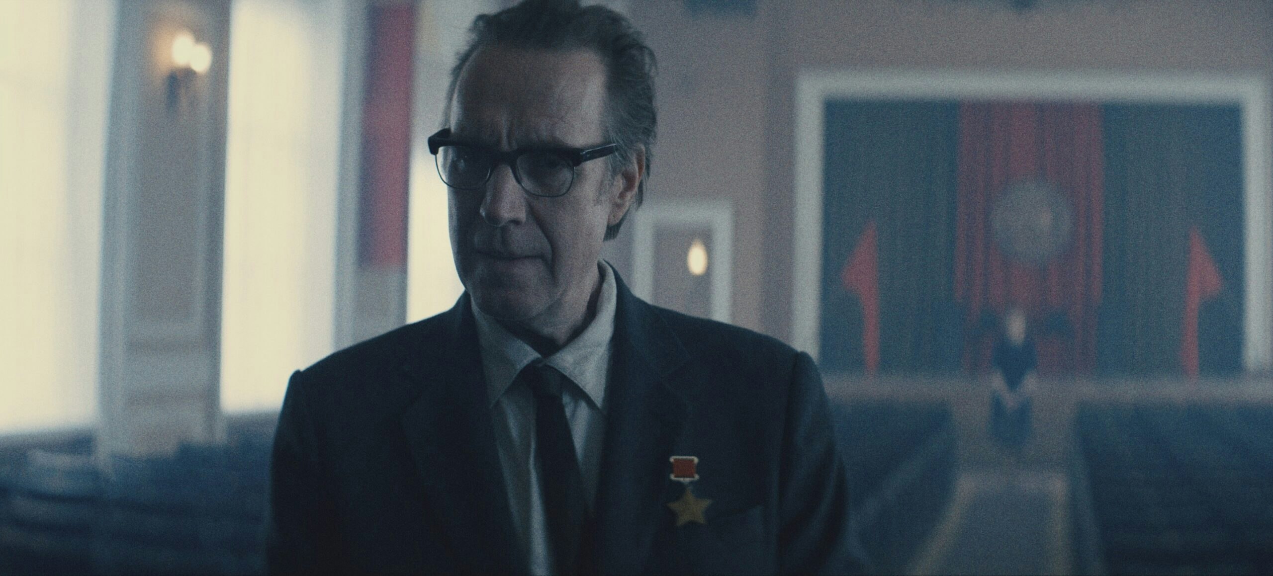 Rhys Ifans as Chief Designer in Star City