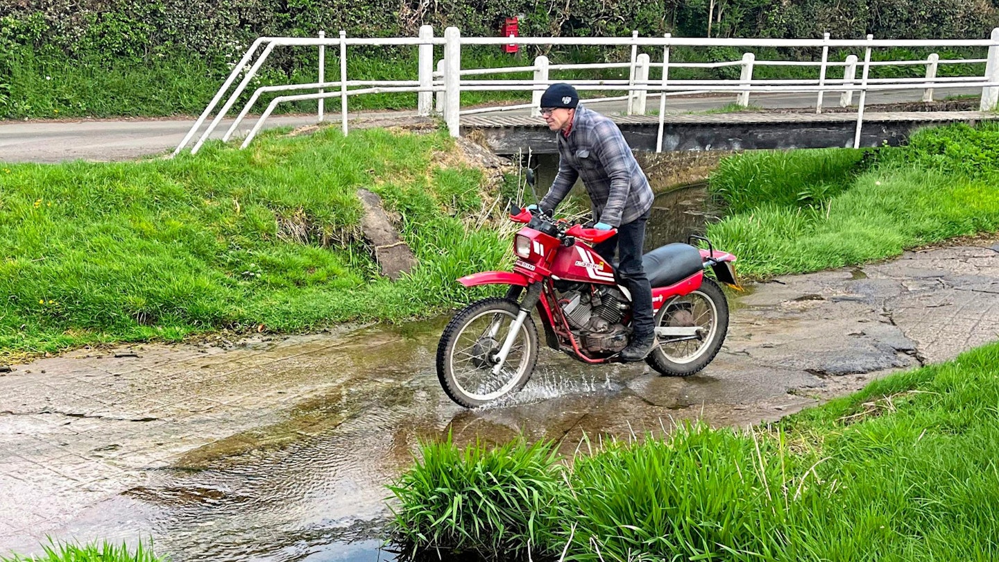 crossing raging torrent