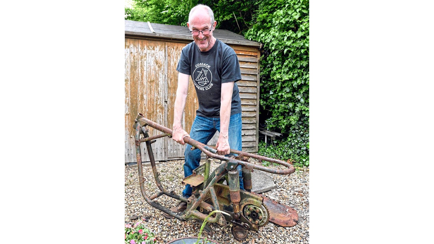 Heavy engineering? Oh yes – Peter can barely lift the weight of the spare BSA-ish tubular steel frame.
