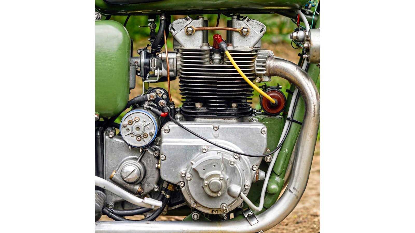 Alternator lives inside the timing-side engine casing