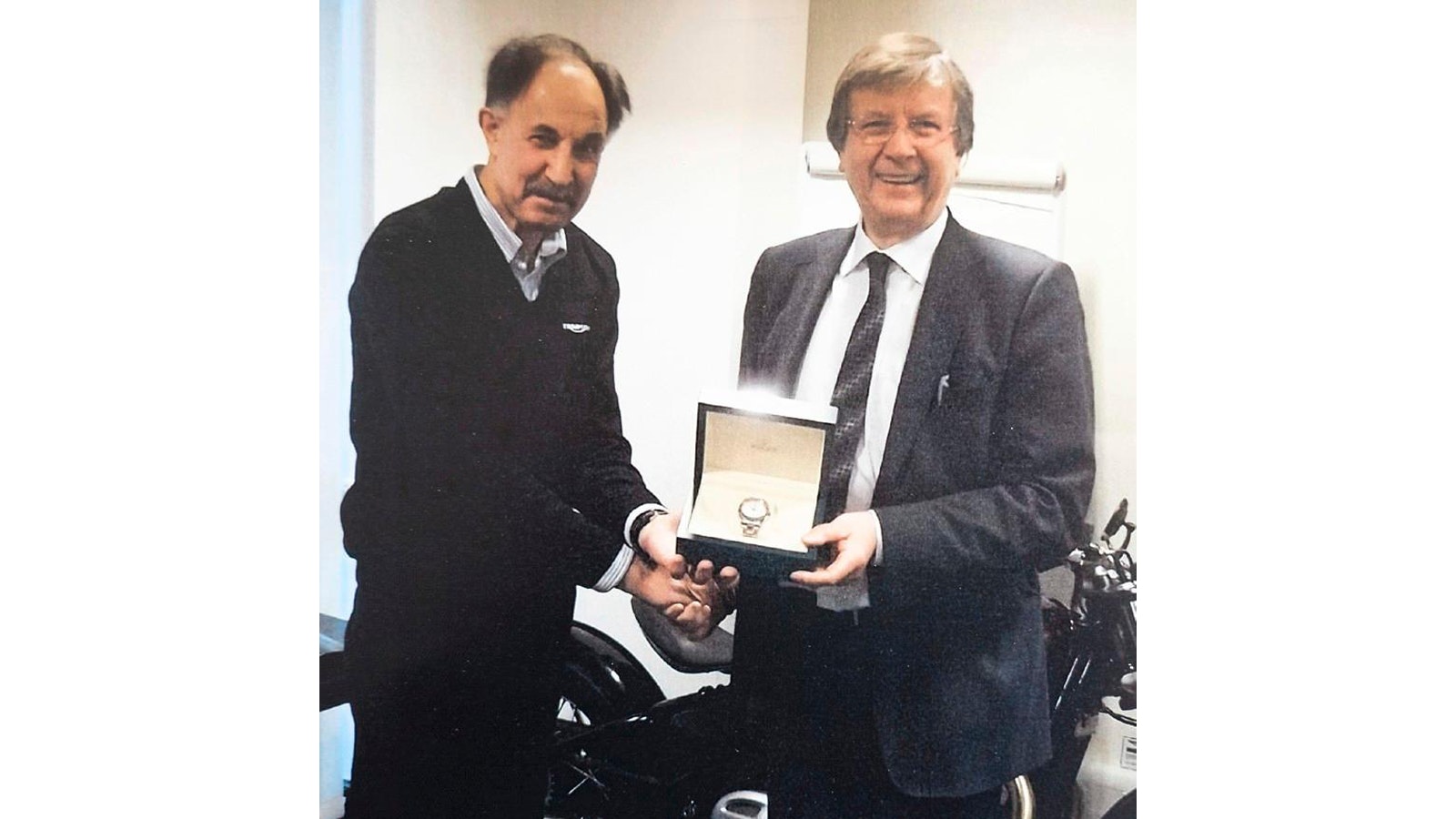 ...and 28 years later he receives his retirement gift from Triumph boss John Bloor in 2019. Quite a run, that