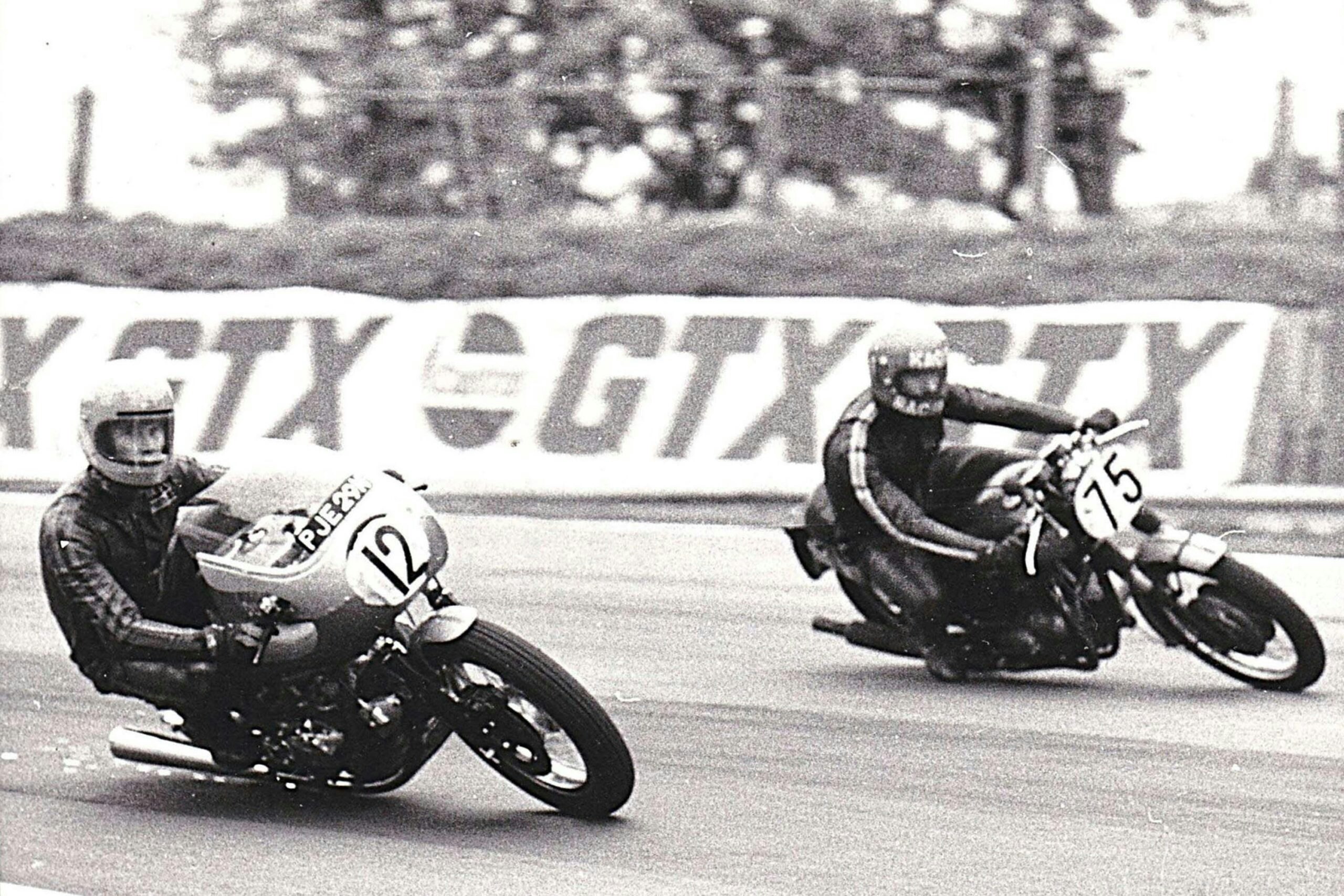 Alan (#12) races his new Ducati 750SS road bike for the first time in 1974. Note the reg number still on the screen, and the exhaust getting ground away…