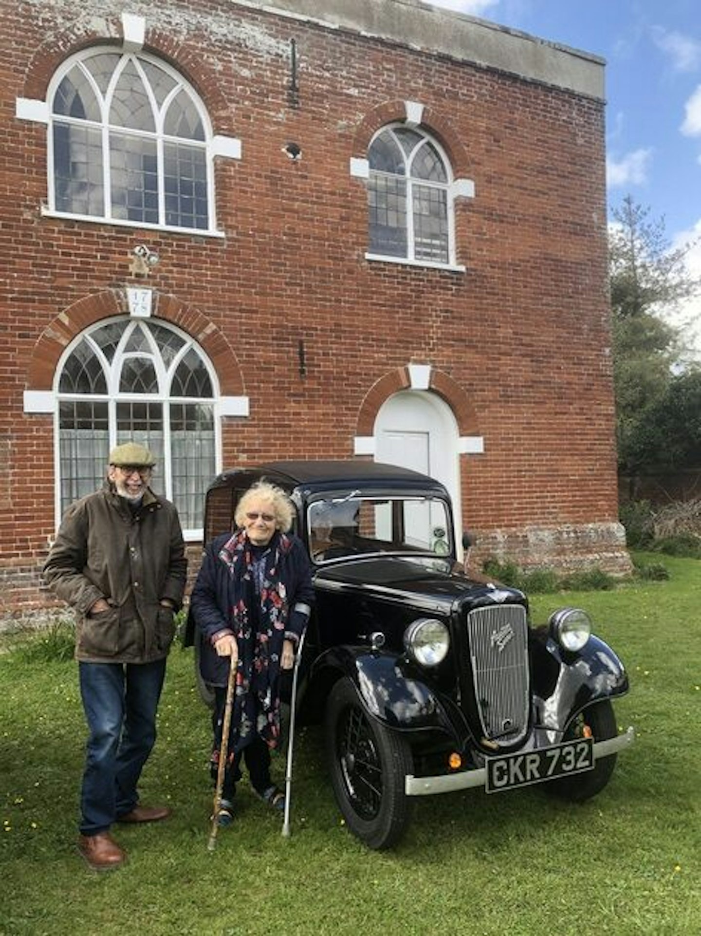 Lawrence and Nicky Gardener of Uggeshall, Suffolk at Wrentham Chapel with their 1936 Austin Ruby