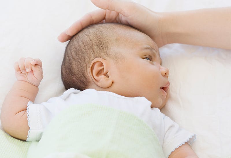 Study shows gently stroking babies ‘provides pain relief’ Baby